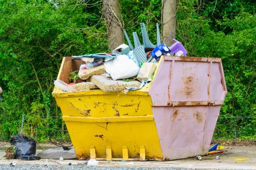 Commercial skip placed at a construction site in Hendon