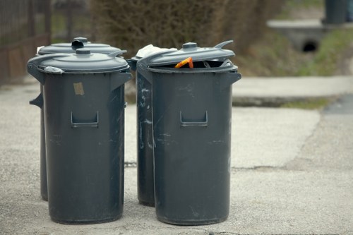 Construction workers segregating waste on-site