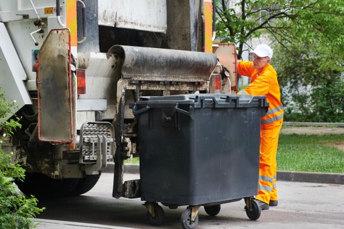Workers segregating construction waste on site